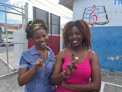 Davia Lawrence (left) and Ashley Mair proudly showed that they voted in yesterday’s general election.