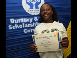 Credit: Ian Allen Jessica Jones shows off her certificate after being awarded her scholarship.