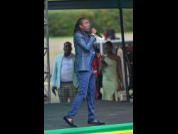 Recording artiste Nesbeth performs his hit song, ‘My Dream’, at the swearing-in ceremony for Dr Andrew Holness as Prime Minister last Tuesday. 