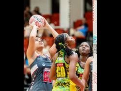 Action between Tonga and the young Sunshine Girls during the Netball World Youth Cup in Gibraltar on Sunday. Jamaica won 66-43.