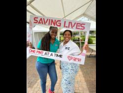 Founder and Managing Director of iHAH Foundation, Abi-Gaye Smythe (left), and co-founder of Margin to Centre, Dr Samantha Johnson, at the foundation’s blood drive held recently in Emancipation Park, New Kingston.