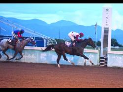  IS THAT A FACT (right), ridden by Shaheem Gordon, wins the Errol ‘Big Sub’ Subratie Memorial Trophy over a mile ahead of RUN JULIE RUN (Dane Dawkins)  at Caymanas Park on October 18, 2025.