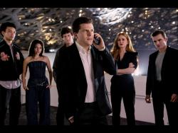 This image released by Lionsgate shows (from left) Justice Smith, Ariana Greenblatt, Dominic Sessa, Jesse Eisenberg, Isla Fisher and Dave Franco in a scene from “Now You See Me: Now You Don’t.”