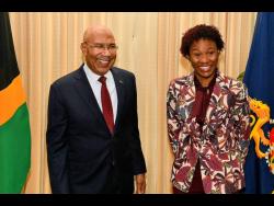 Governor-General, His Excellency the Most Honorable Sir Patrick Allen, shares a light moment with 2026 Rhodes Scholar, Tiana Dinham, during the official announcement ceremony at King’s House on November 13.
