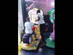 =Wards take a spin on a motorcycle arcade game.