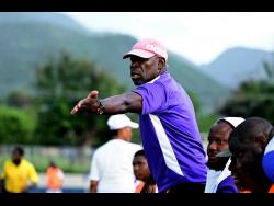 Kingston College’s head coach Vassell Reynolds.