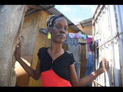 Tiesha Milne in her home in Cassava Piece, St Andrew.