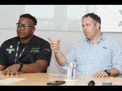 Yoni Epstein (right), chairman, Montego Bay United Football Club (MBUFC), speaking, while Dr Germaine Spencer, president of MBUFC, looks on during a press conference.