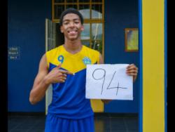 Ardenne High School’s Mowan Bonnick displays his points total against Bridgeport High School during this year’s ISSA under-19 urban basketball competition. 