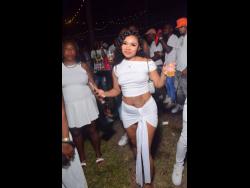 Roshelle sparkles in white at Tea Cup, held recently in Rhymesbury, Clarendon.

