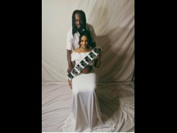 Dancehall couple KipRich and Kizzy showed off a copy of their ultrasound and Kizzy’s ‘baby bump’, as they welcome their first child together. 