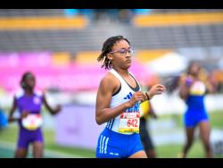 Anya Johnson of Immaculate Conception High competing in the heats  of the Class Four 200m at last year’s  ISSA/GraceKennedy Boys and Girls’ Athletics Championships.