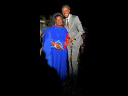 Xavier McFarlane shares a proud moment with his mother, Sonia McFarlane, at his graduation.