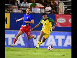 Jamaica’s Leon Bailey in action, dribbling away from the United States’ Antonee Robinson during the Concacaf Nations League semi-final at the National Stadium in Kingston on Thursday, November 14, 2024. 