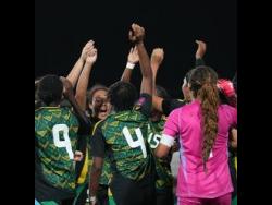Jamaica’s under-17 Reggae Girlz celebrating.