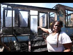 The remains of the Alton Villa house stand silent after flames ripped through the building, leaving dressmaker Letitia Wright and her spouse with nothing but ashes and memories.