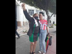 Sophia Lugg (left), mother of Donna-Lee Donaldson, celebrates the guilty verdict with her sister and Donaldson’s aunt, Johana Lugg.