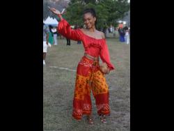 Attorney-at-law and model Celine Deidrick is all smiles at the recent Lost In Time Music Festival held at Hope Gardens in St Andrew.
