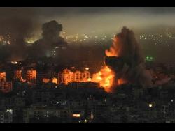 Smoke and flames rise from buildings following an Israeli airstrike in Dahiyeh, Beirut’s southern suburbs, Lebanon, earlier this week.