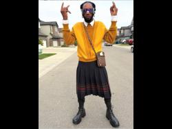 Shizzle Sherlock dons Scottish-style kilt.