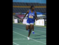 Shemonique Hazle of Hydel High wins her Class One 100 metres heat in a wind-aided 11.44 seconds.