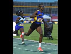 Credit: Ian Allen Shakeya Reid of Penwood High wins heat four of the Class One girls’ 100 metres in a personal best 11.67 seconds.
