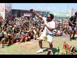 Soca artiste Voice interacts with patrons during his performance at Xodus Wet yesterday at Port Spectrum, downtown Kingston.