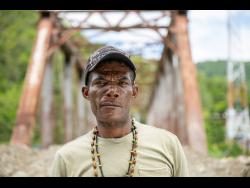 Cephas Johnson revisits the bridge where he was pulled from the brink of death by rescuers.