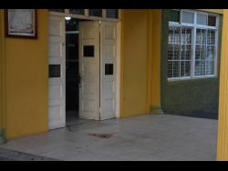 Blood is seen outside the New Testament Church of God on Water Lane, St James where Thompson was gunned down on Wednesday as a service was being held inside.