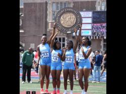Members of the Edwin Allen High sprint relay team who won the Championship of America  4x100m title at the Penn Relays in Philadelphia on Saturday. From left: Alexxe Henry, Moesha Gayle, Reneica Edwards and Kellyann Carr. 