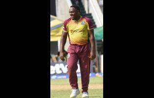 Left: Odean Smith captured four wickets for West Indies against New Zealand on Sunday.
