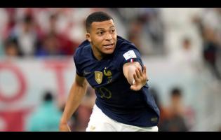 France’s Kylian Mbappe in action during the World Cup round-of-16  match against Poland, at the Al Thumama Stadium in Doha, Qatar, on Sunday. France won 3-1.