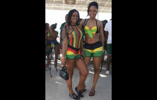 Natiesha Harrison (left) shares lens with Kim Possible at BritJam Spring Break Festival’s Beach Lyme held recently at Sea Island in Montego Bay, St James.