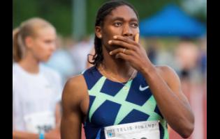 FILE - Caster Semenya reacts before the women’s 5,000 metre race in Regensburg, Germany in June 2021. Track and field banned transgender athletes from international competition on Thursday, while adopting new regulations that could keep Semenya and other athletes with differences in sex development from competing.