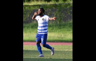 Vere’s Kemar Beckford celebrates after scoring against Lime Hall in their Jamaica Premier League encounter at Stadium East on Sunday.