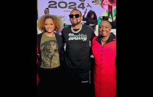 Minister of Culture, Gender, Entertainment and Sport,  Olivia Grange (right), poses with Grammy award-winning entertainer Sean Paul (centre), and American actress Sundra Oakley during the recent Jamaica Creative Career Expo, which was held at the Jamaica Conference Centre in downtown Kingston. 