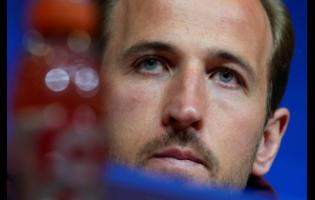 Bayern’s Harry Kane attends a news conference in Munich, Germany, yesterday ahead of the Champions League quarterfinal second leg against Arsenal.