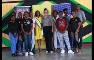 Miss Kingston and St Andrew Festival Queen 2023, Jhanielle Powell (sixth left), and Marketing Director, Bob Marley Group of Companies, Julia Vaz (sixth right), with ‘Flip The Script’ film project student participants.