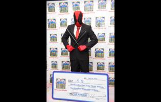 CG, who is going home with $163.5 million from the Super Lotto jackpot, chose a Deadpool outfit to collect his symbolic cheque.