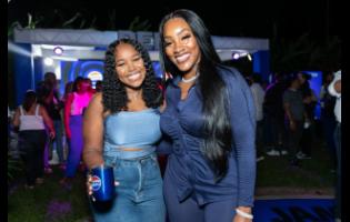  Leading social media influencers Tonaya Wint (left) and Tanaania share a moment with our lens at the Pepsi ‘New Beats, Same JamaICAN Flava’ campaign launch. 