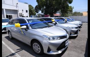 Some of the 12 motors cars that were handed over to the Transport Authority during a ceremony held at the Authority’s Maxfield Avenue offices in St Andrew, on Thursday.
