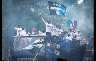 Inter Milan paraded in an open-air bus outside the San Siro stadium to the city cathedral to celebrate the Nerazzurri’s 20th Italian league title in Milan, Italy, yesterday.