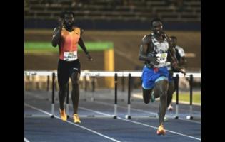 Jamaica's Malik James-King (right), with a 48.39 seconds lifetime best, wins the men's 400 metres hurdles ahead of the British Virgin Island’s  Kyron McMaster at the Jamaica Athletics Invitation at the National Stadium tonight.