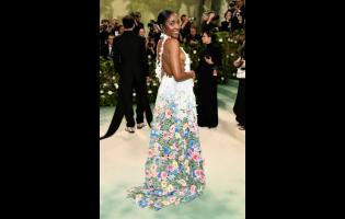 Actress and comedian Ayo Edebiri smiles for the cameras at the recent Met Gala in New York.