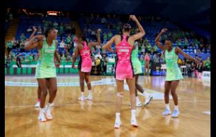 Sunshine Girls  from Australia’s top Super Netball League teams,  West Coast Fever (in green) and Adelaide Thunderbirds, entertain fans with Jamaican dance moves after last Saturday’s  clash between the two teams at the  RAC Arena in the western Australia city of Perth. The Fever won the match 57-56. 