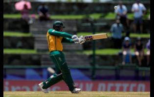 South Africa’s Quinton de Kock hits a six during the ICC Men’s T20 World Cup cricket match between the United States and South Africa at Sir Vivian Richards Stadium in North Sound, Antigua and Barbuda, yesterday.