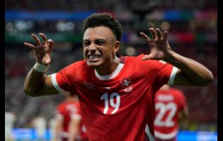 Switzerland’s Dan Ndoye celebrates after scoring in a Group A match between Switzerland and Germany at the Euro 2024 football tournament in Frankfurt, Germany, yesterday.