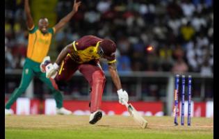 West Indies’ Andre Russell is run out during the ICC Men’s T20 World Cup match against South Africa at the Sir Vivian Richards Stadium in North Sound, Antigua and Barbuda, on Sunday, June 23. 