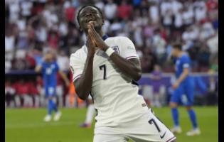 England’s Buckayo Saka reacts after his goal against Slovenia was ruled out for offside during their Euro 24 match in Germany yesterday. The game ended in a 0-0 draw.