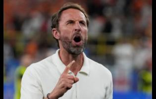 England’s manager Gareth Southgate celebrates at the end of a semifinal against Netherlands at the Euro 2024 football  tournament in Dortmund, Germany, Wednesday, July 10, 2024. England won the game 2-1. 